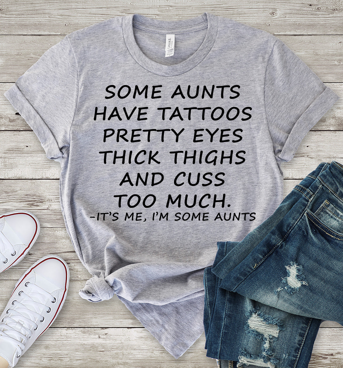 Some_Aunts_Have_Tattoos_Pretty_Eyes_Thick_Thighs_and_Cuss_Too_Much_Light_Heather_Grey_T-Shirt.jpg Some Aunts Have Tattoos Pretty Eyes Thick Thighs and Cuss Too Much T-Shirt