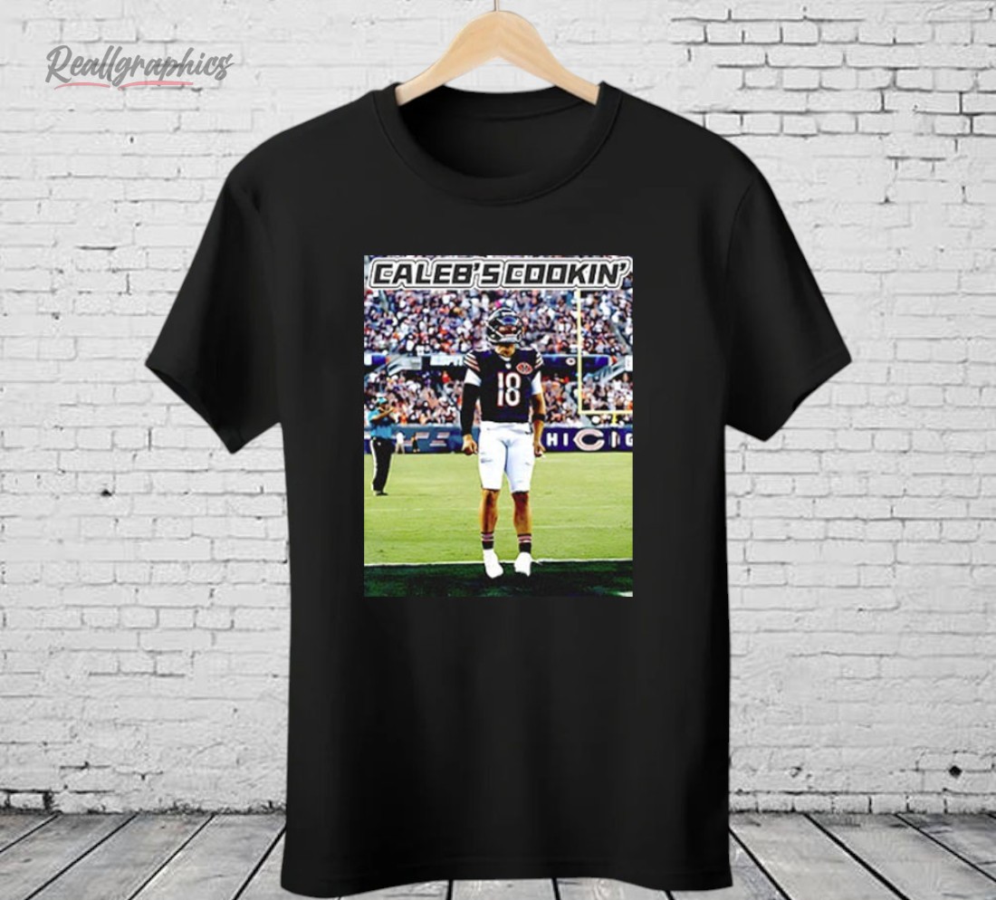 caleb-williams-caleb_s-cookin-shirt-3_p6vnf0 Caleb Williams Caleb’s Cookin Shirt