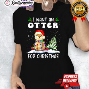 i want an otter for christmas santa hat graphic shirt 1 vjgqif